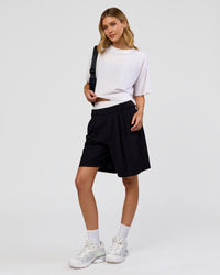 Woman wearing Go-To FLXCotton Skimmer Tee - White-White | Model:Leilani | Size:XS