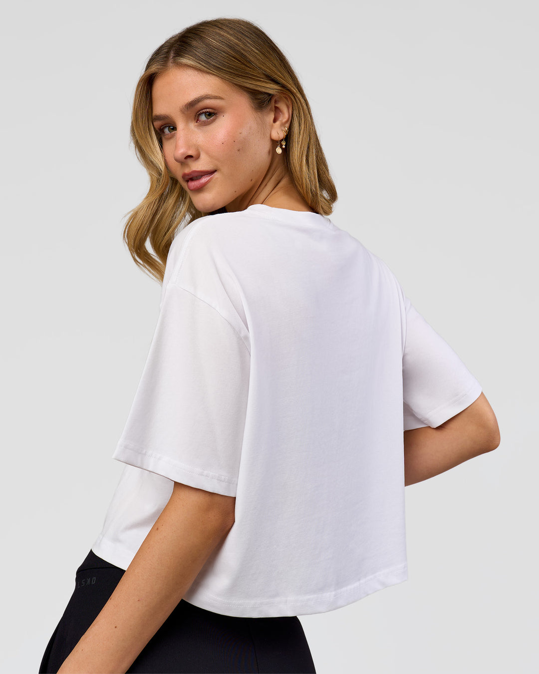 Woman wearing Go-To FLXCotton Skimmer Tee - White-White | Model:Leilani | Size:XS
