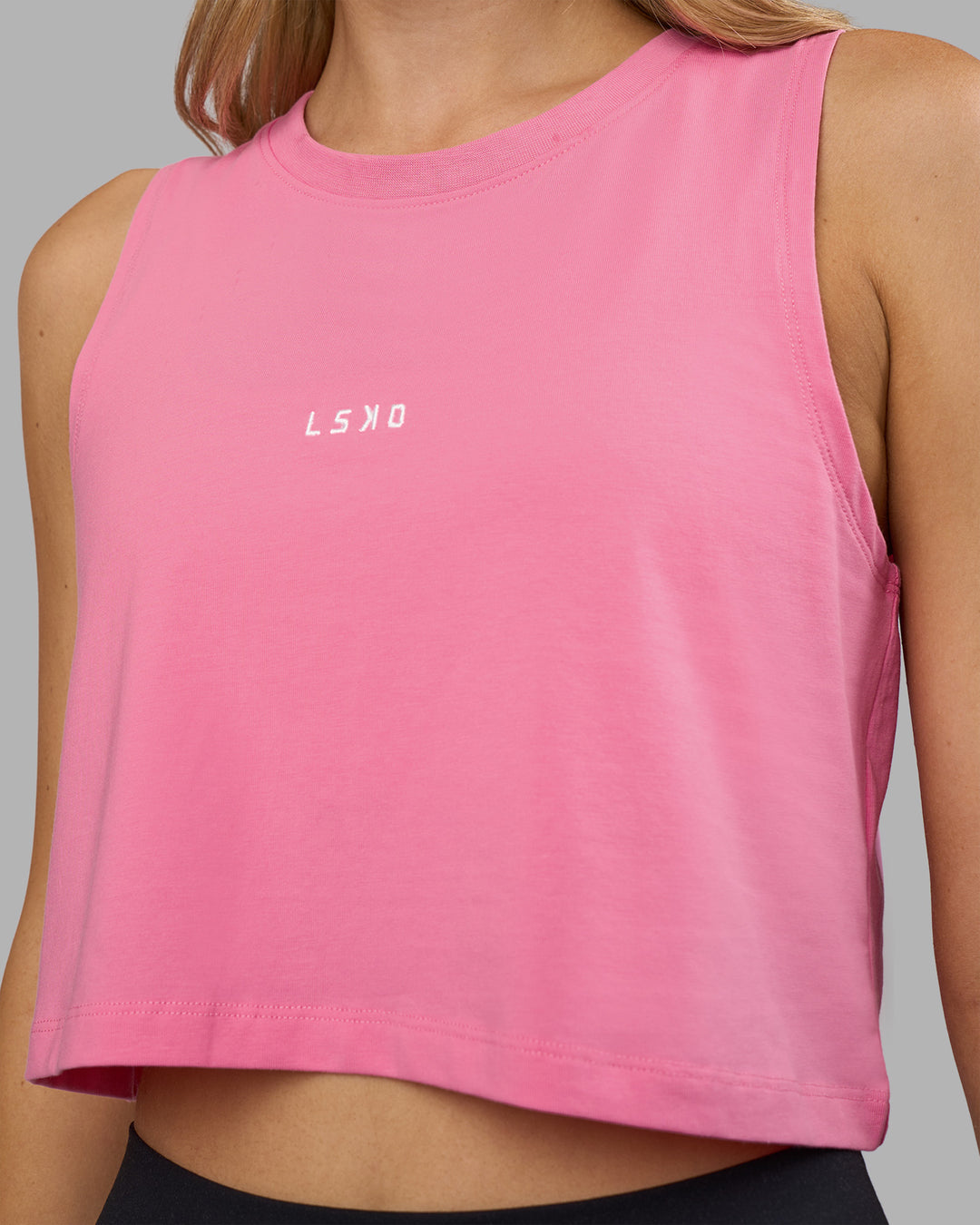 Woman wearing Go-To FLXCotton Tank - Candy Pink-White | Model:Leilani | Size:XS