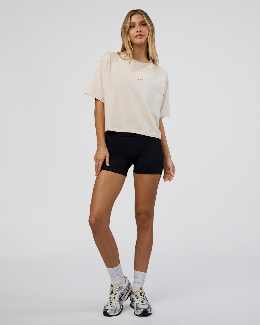 Woman wearing Go-To Heavy Weight FLXCotton Graphic Skimmer Tee - Off White-Multi | Model:Leilani | Size:XS