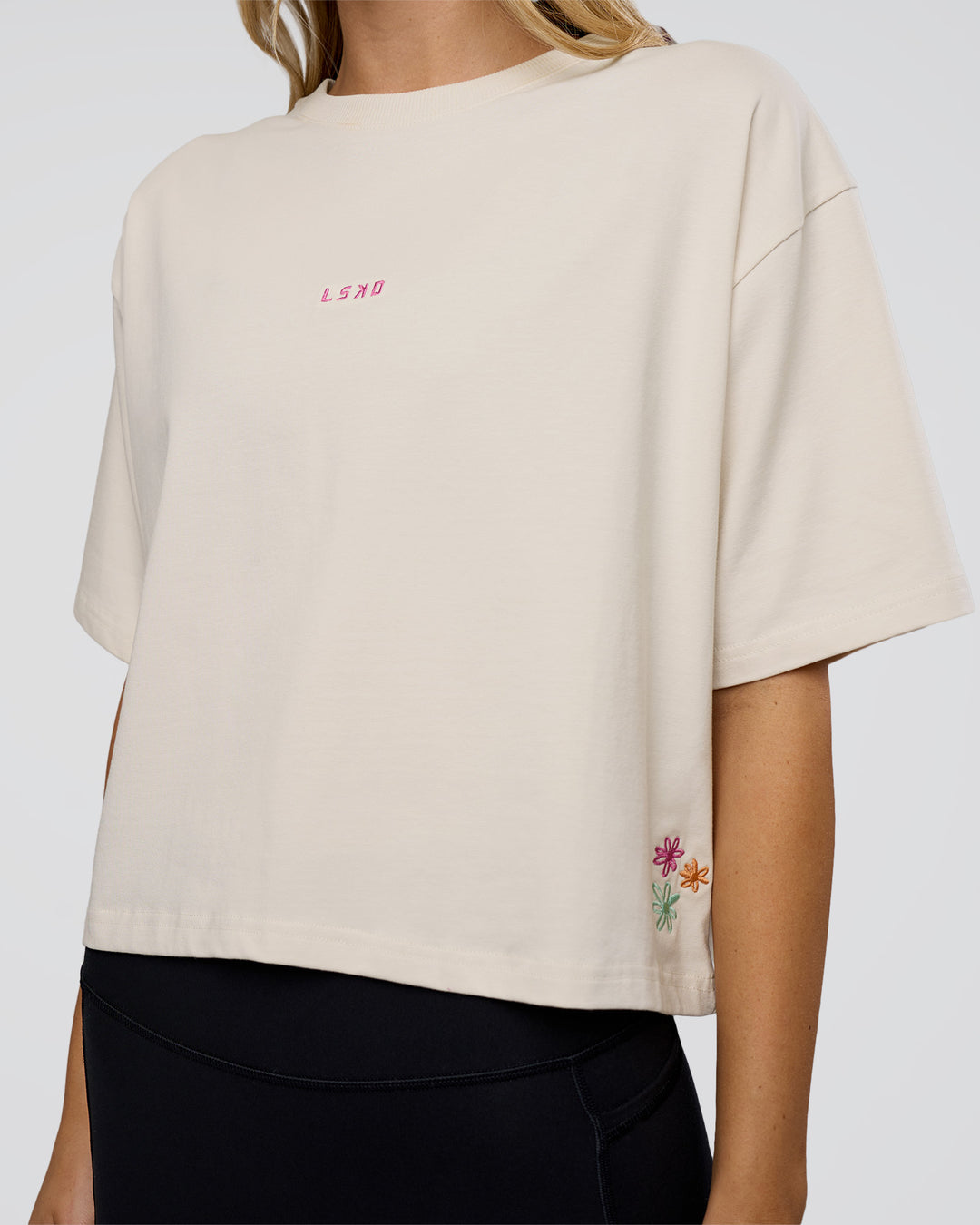 Woman wearing Go-To Heavy Weight FLXCotton Graphic Skimmer Tee - Off White-Multi | Model:Leilani | Size:XS