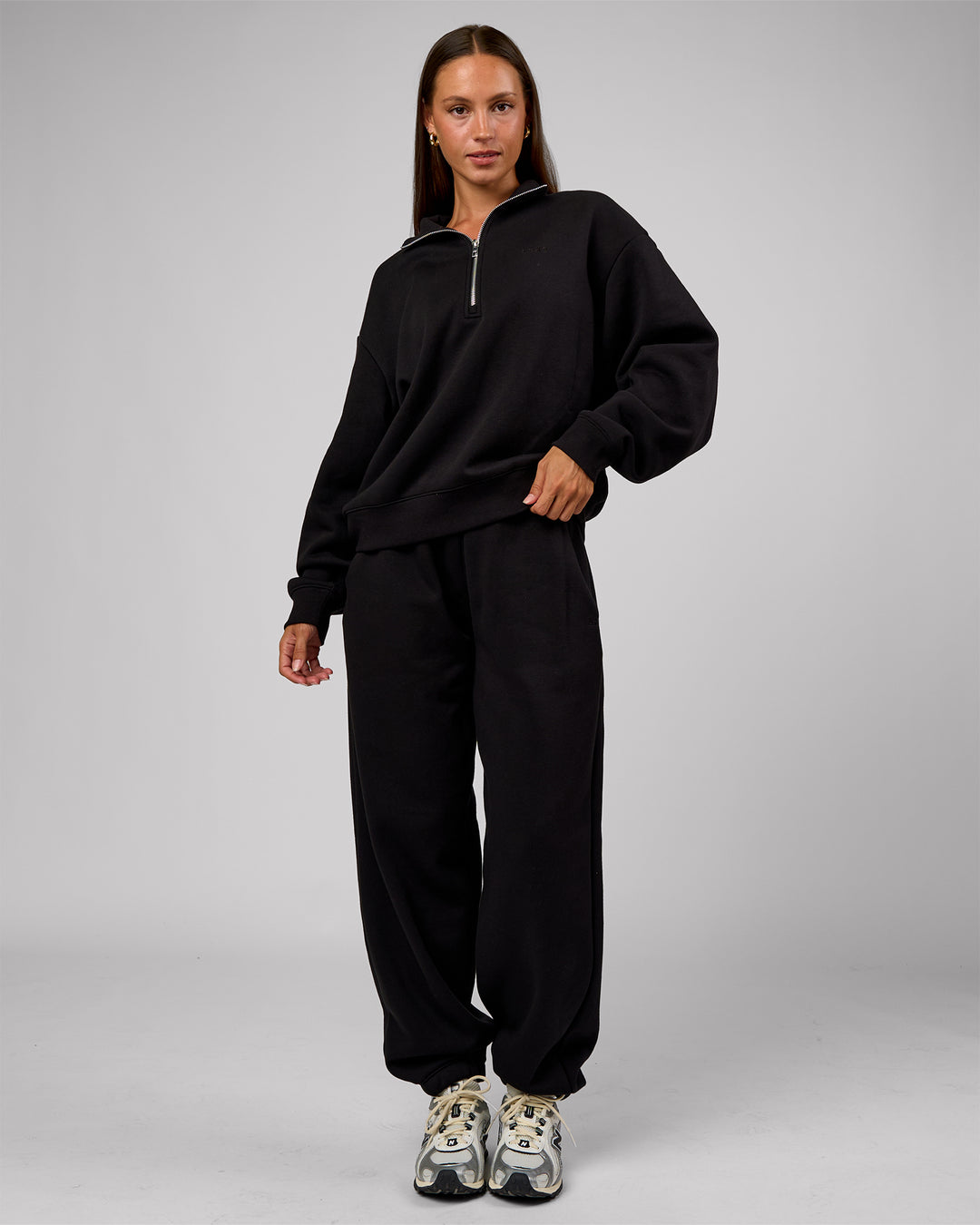 Woman wearing Go-To Oversized Quarter Zip Sweater - Black | Model:Brylee | Size:XS