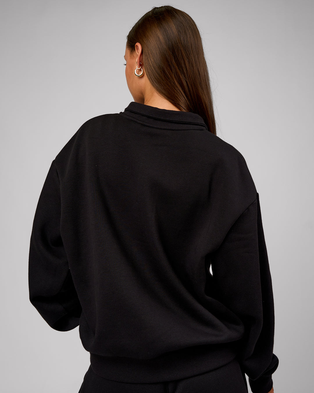 Woman wearing Go-To Oversized Quarter Zip Sweater - Black | Model:Brylee | Size:XS