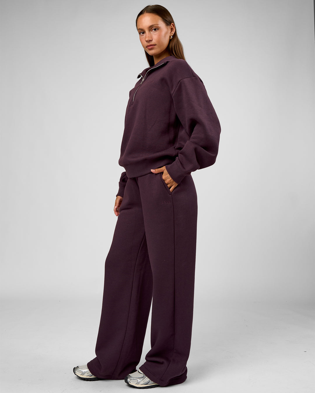 Woman wearing Go-To Oversized Quarter Zip Sweater - Midnight Plum | Model:Brylee | Size:XS