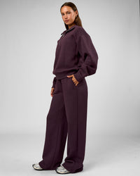 Woman wearing Go-To Oversized Quarter Zip Sweater - Midnight Plum | Model:Brylee | Size:XS