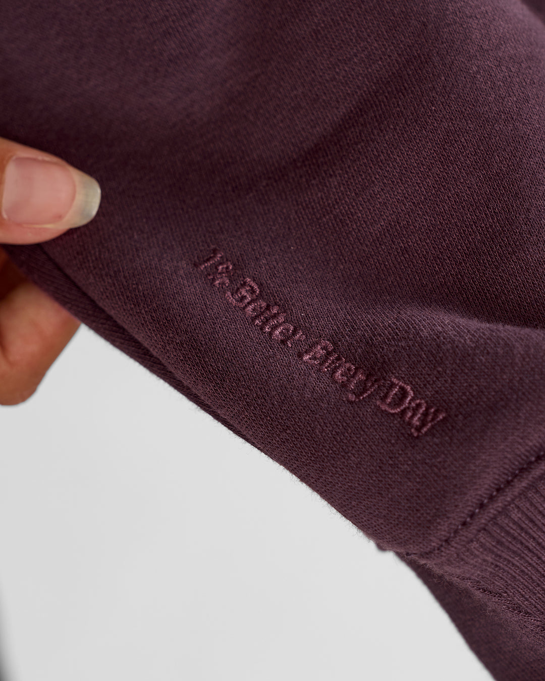 Woman wearing Go-To Oversized Quarter Zip Sweater - Midnight Plum | Model:Brylee | Size:XS