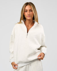 Woman wearing Go-To Oversized Quarter Zip Sweater - Silver Marl | Model:Georgia | Size:XS