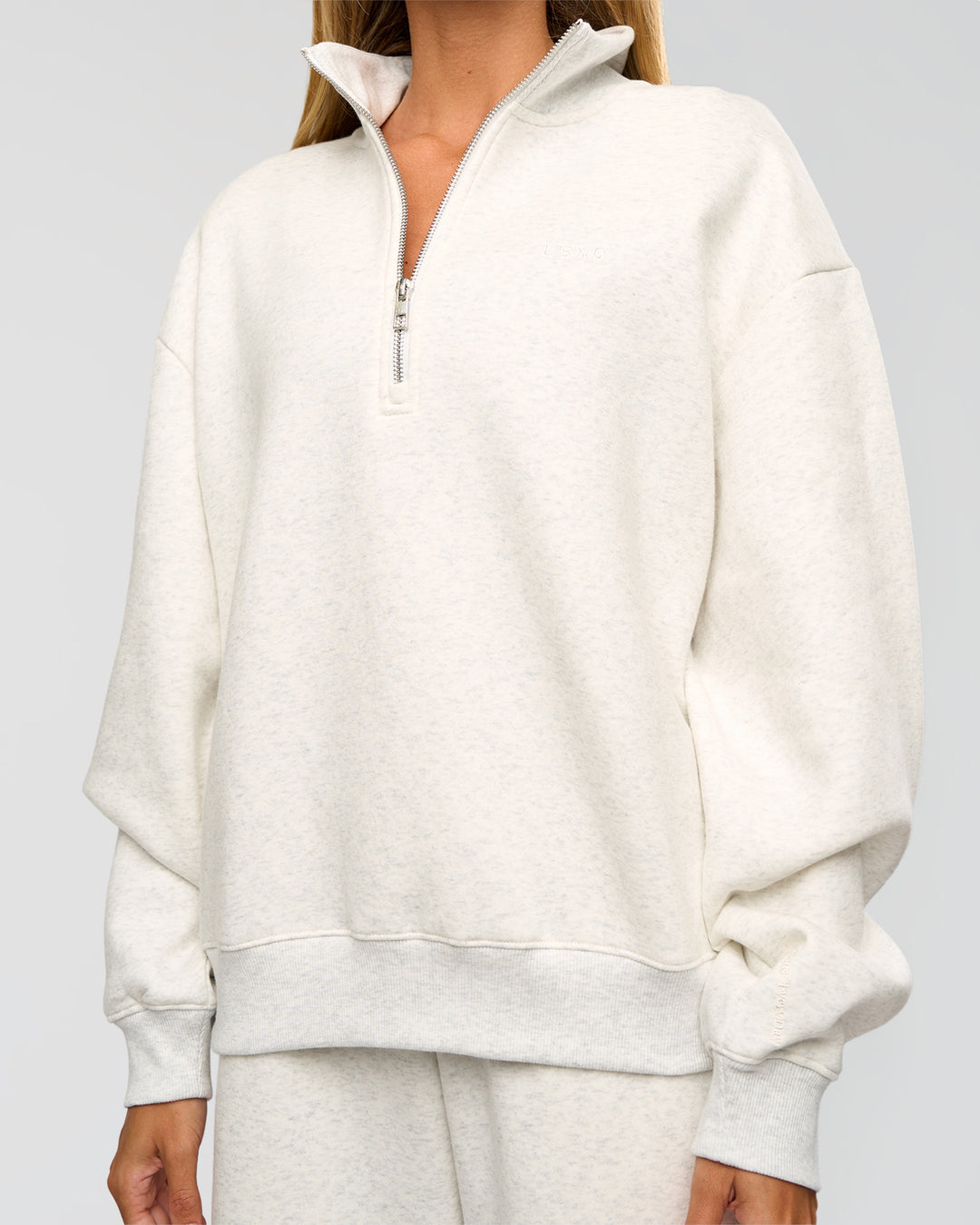 Woman wearing Go-To Oversized Quarter Zip Sweater - Silver Marl | Model:Georgia | Size:XS