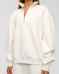 Woman wearing Go-To Oversized Quarter Zip Sweater - Silver Marl | Model:Georgia | Size:XS