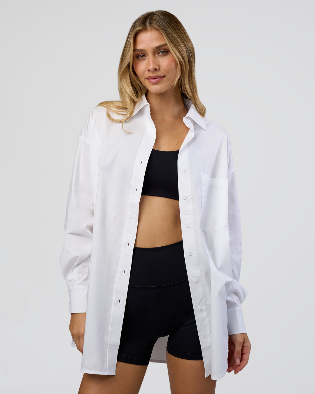 Woman wearing Go-To Oversized Shirt - White | Model:Leilani | Size:XS