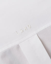 Woman wearing Go-To Oversized Shirt - White | Model:Leilani | Size:XS