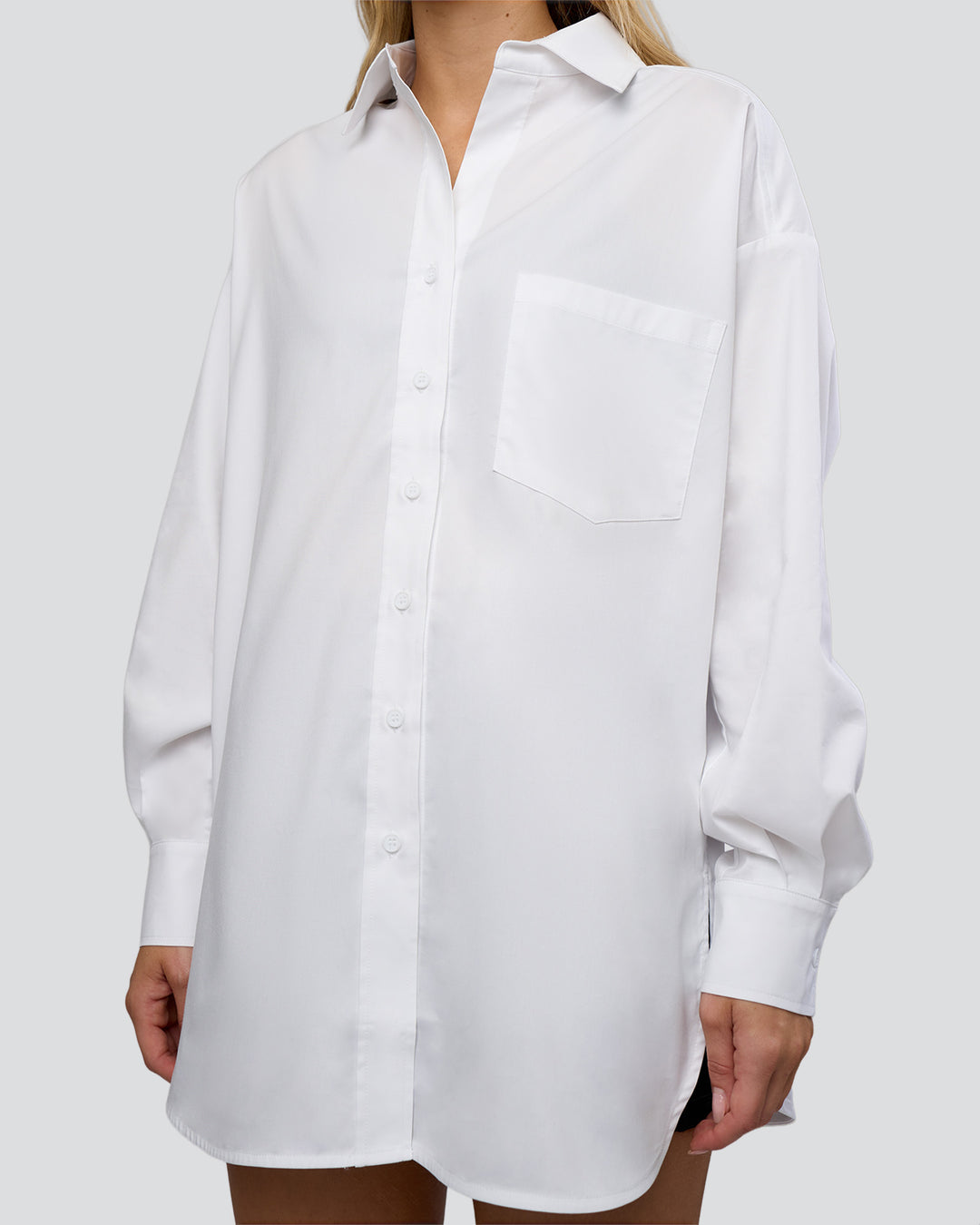 Woman wearing Go-To Oversized Shirt - White | Model:Leilani | Size:XS