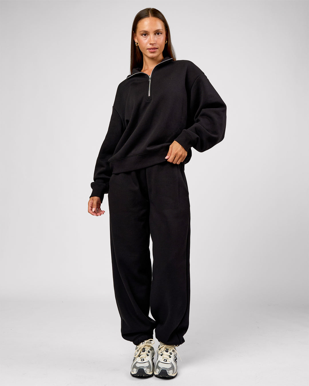 Woman wearing Go-To Oversized Track Pant - Black | Model:Brylee | Size:XS - view 2