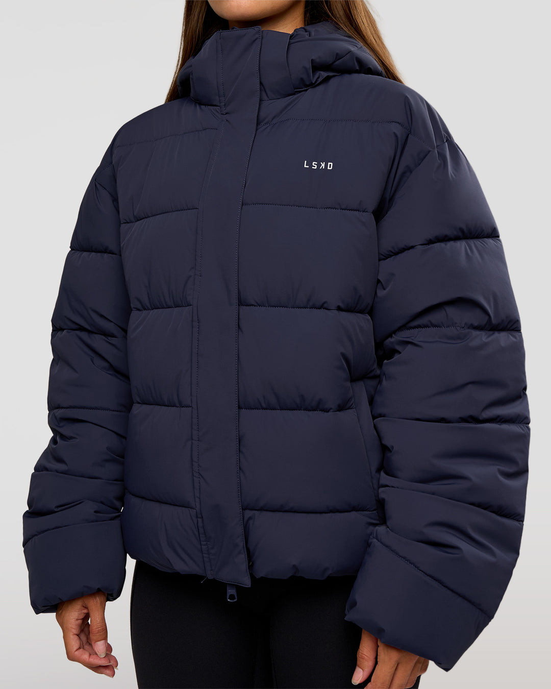 Woman wearing Go-To Puffer Jacket - Future Navy | Model:Brylee | Size:XS - view 11