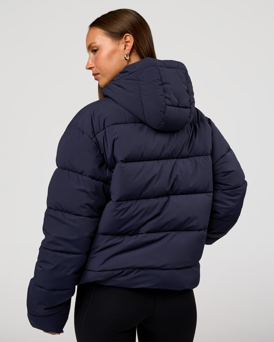 Woman wearing Go-To Puffer Jacket - Future Navy | Model:Brylee | Size:XS - view 4