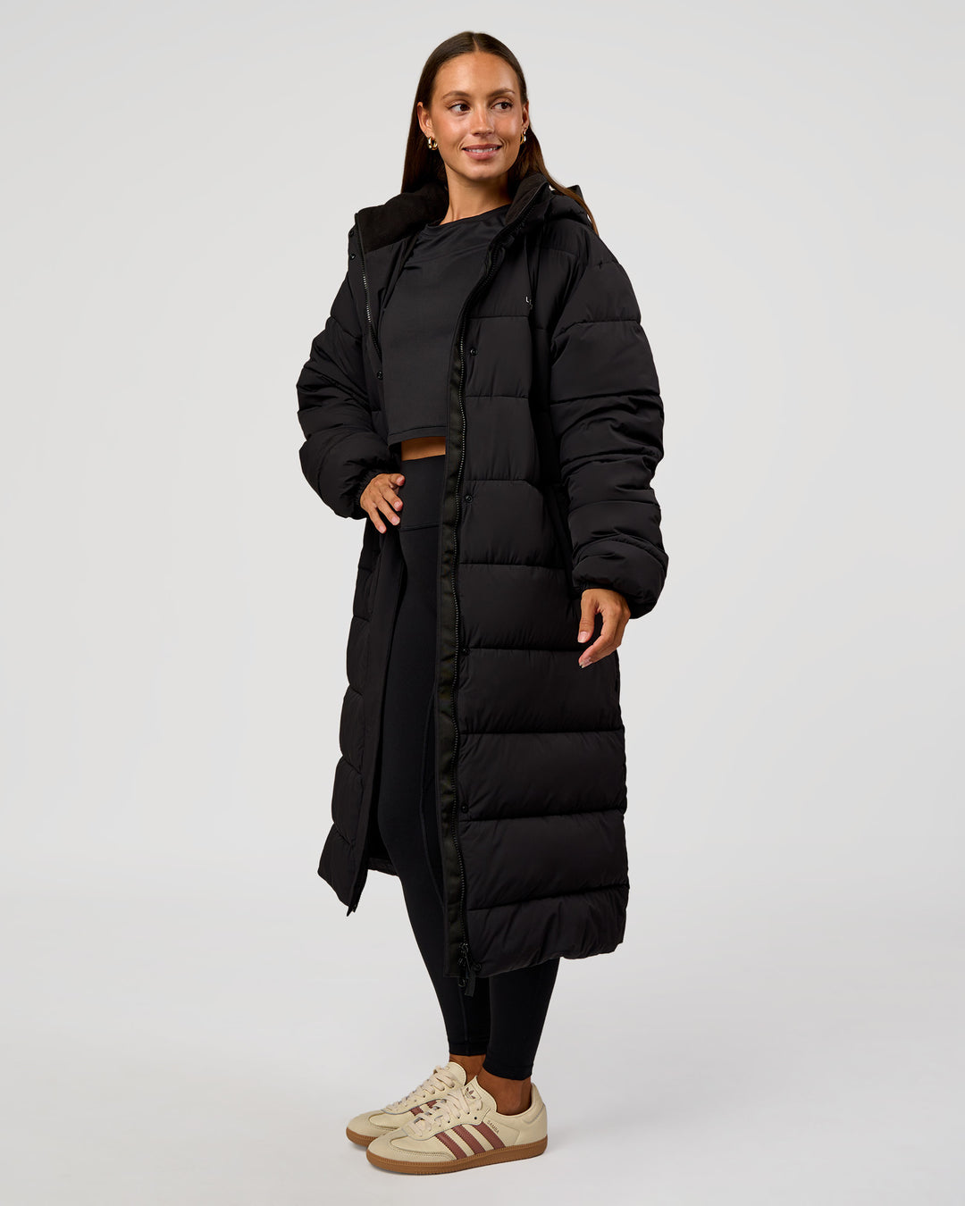 Woman wearing Go-To Puffer Long Jacket - Black | Model:Brylee | Size:XS