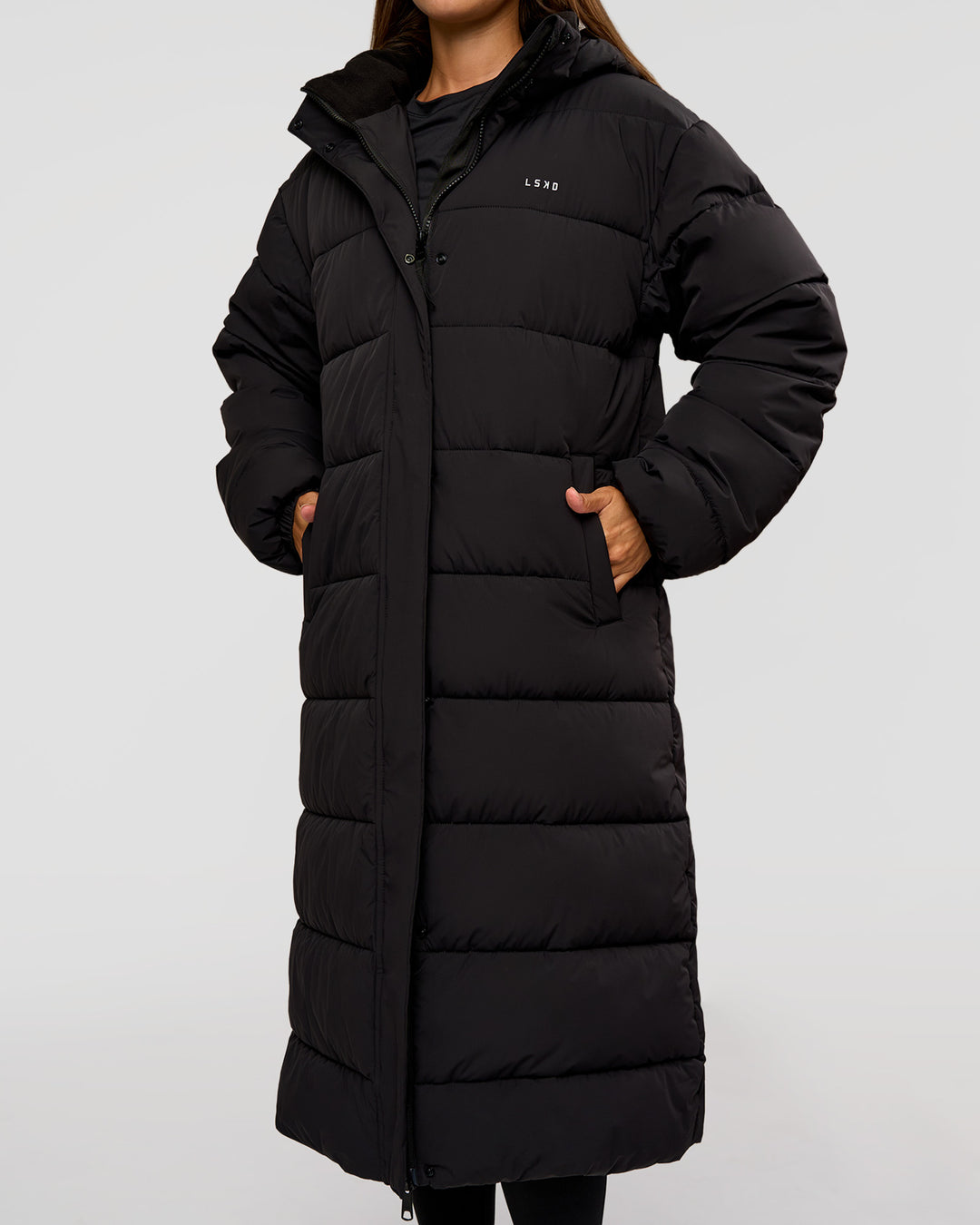 Woman wearing Go-To Puffer Long Jacket - Black | Model:Brylee | Size:XS