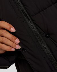 Woman wearing Go-To Puffer Mid Jacket - Black | Model:Brylee | Size:XS