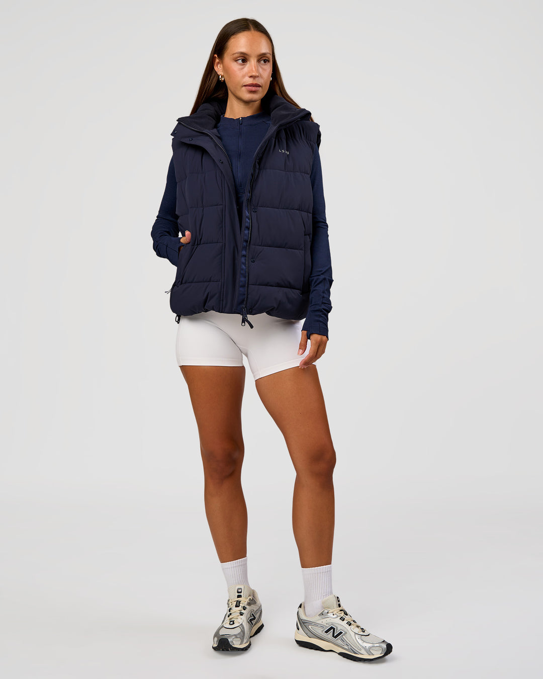 Woman wearing Go-To Puffer Vest - Future Navy | Model:Brylee | Size:XS
