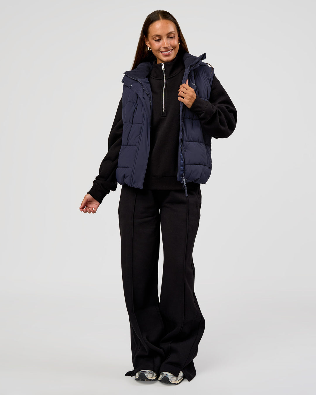 Woman wearing Go-To Puffer Vest - Future Navy | Model:Brylee | Size:XS