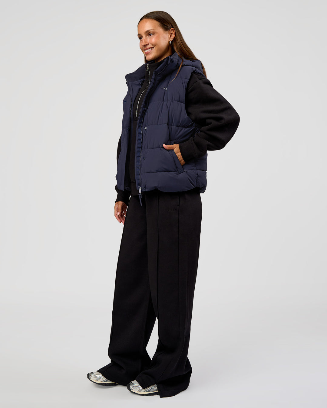 Woman wearing Go-To Puffer Vest - Future Navy | Model:Brylee | Size:XS