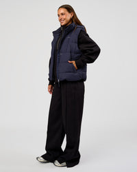 Woman wearing Go-To Puffer Vest - Future Navy | Model:Brylee | Size:XS