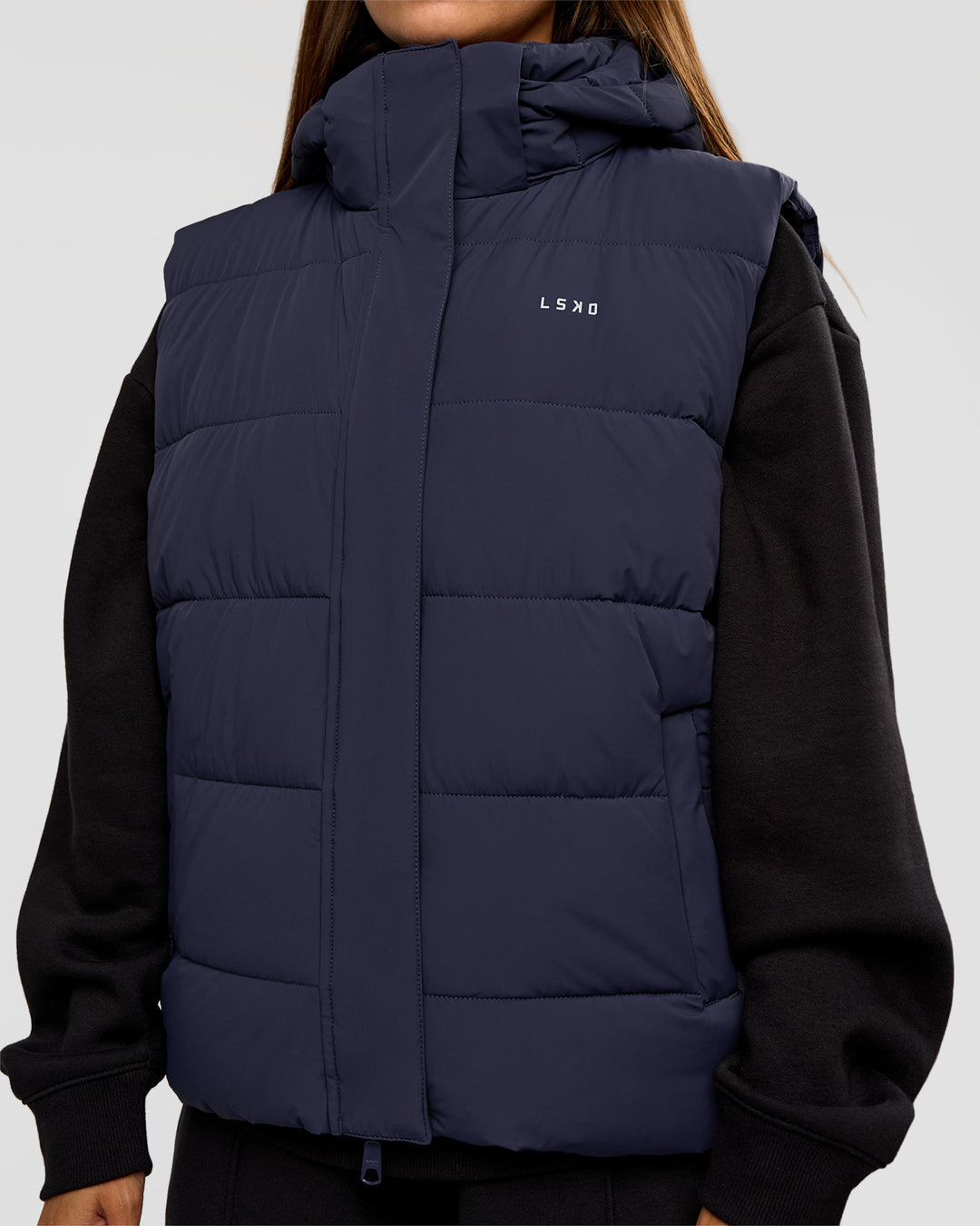 Woman wearing Go-To Puffer Vest - Future Navy | Model:Brylee | Size:XS