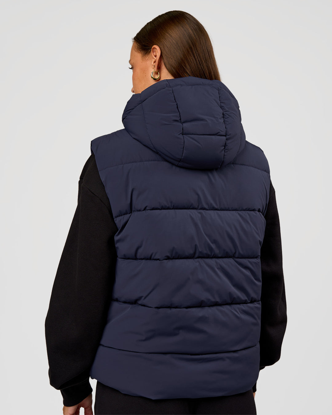 Woman wearing Go-To Puffer Vest - Future Navy | Model:Brylee | Size:XS