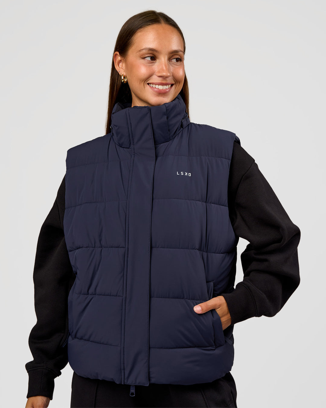 Woman wearing Go-To Puffer Vest - Future Navy | Model:Brylee | Size:XS