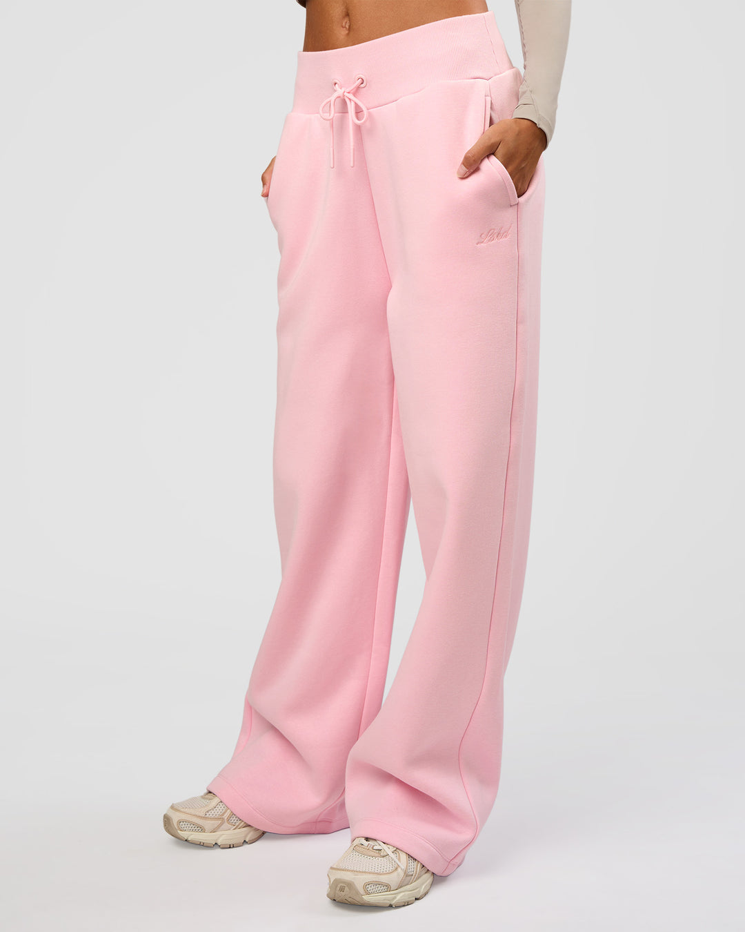 Woman wearing Go-To Script Wide Leg Track Pant - Marshmallow | Model:Georgia | Size:XS