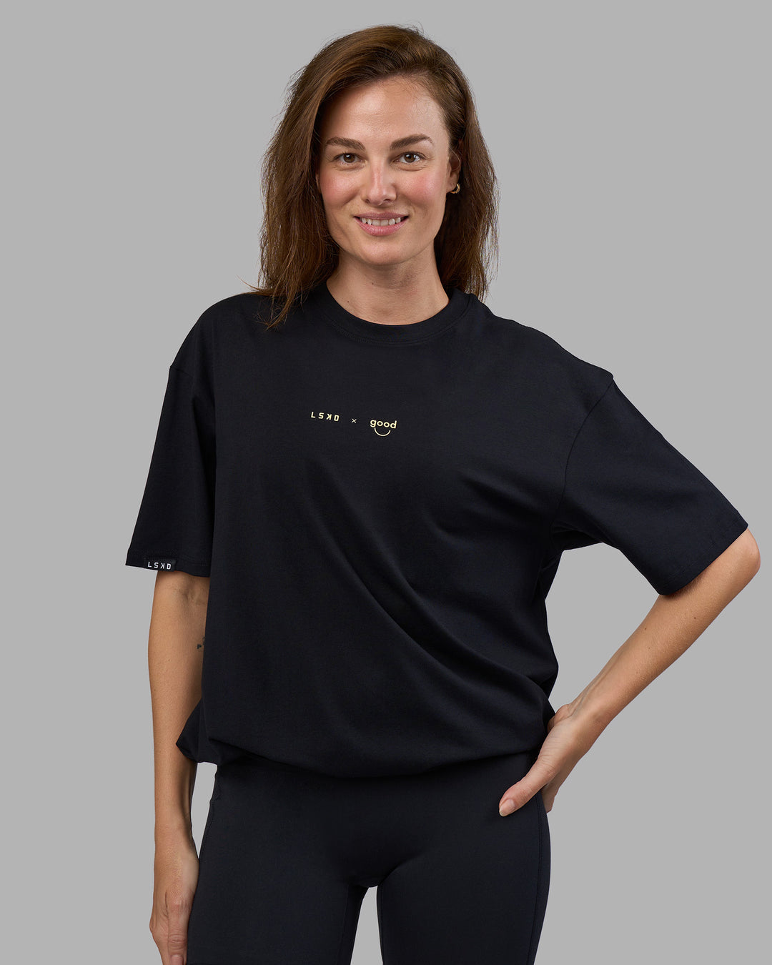 Woman wearing Good Human Factory Vol 2 FLXCotton Oversize Tee - Black | Size:XS