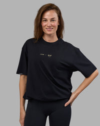 Woman wearing Good Human Factory Vol 2 FLXCotton Oversize Tee - Black | Size:XS