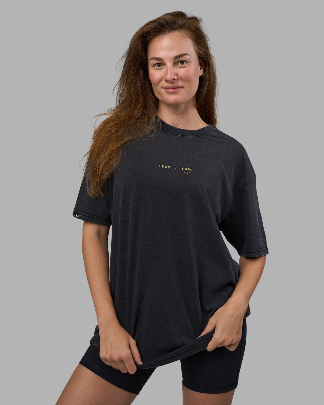 Woman wearing Good Human Factory Vol 2 FLXCotton Oversize Tee - Black Washed | Size:XS
