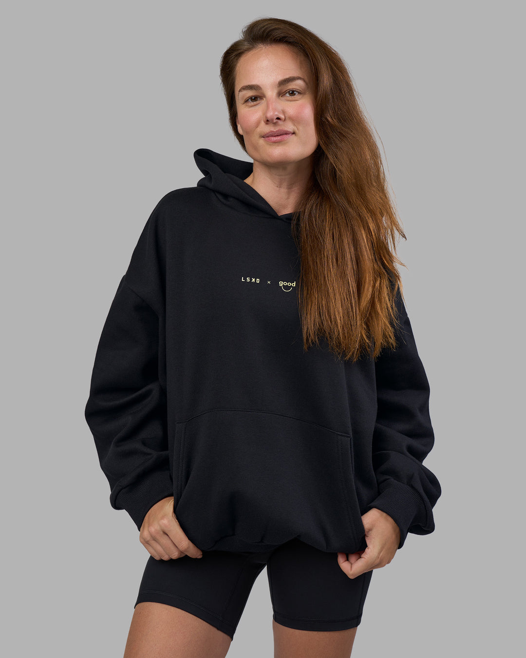 Woman wearing Good Human Factory Vol 2 Hoodie - Black | Model:Carol | Size:XS