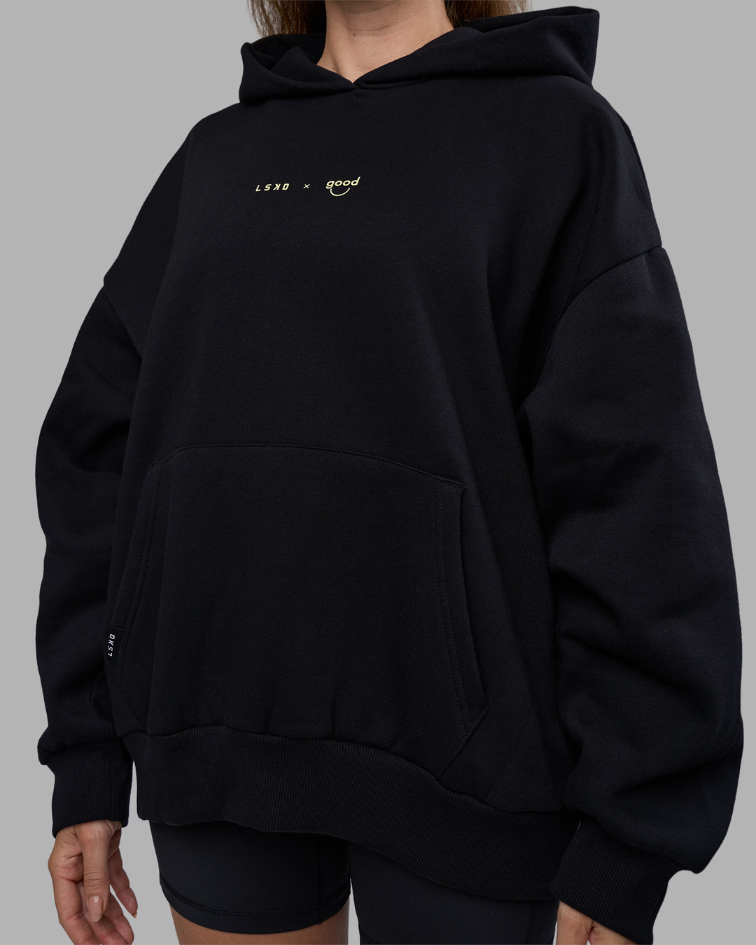 Woman wearing Good Human Factory Vol 2 Hoodie - Black | Model:Carol | Size:XS