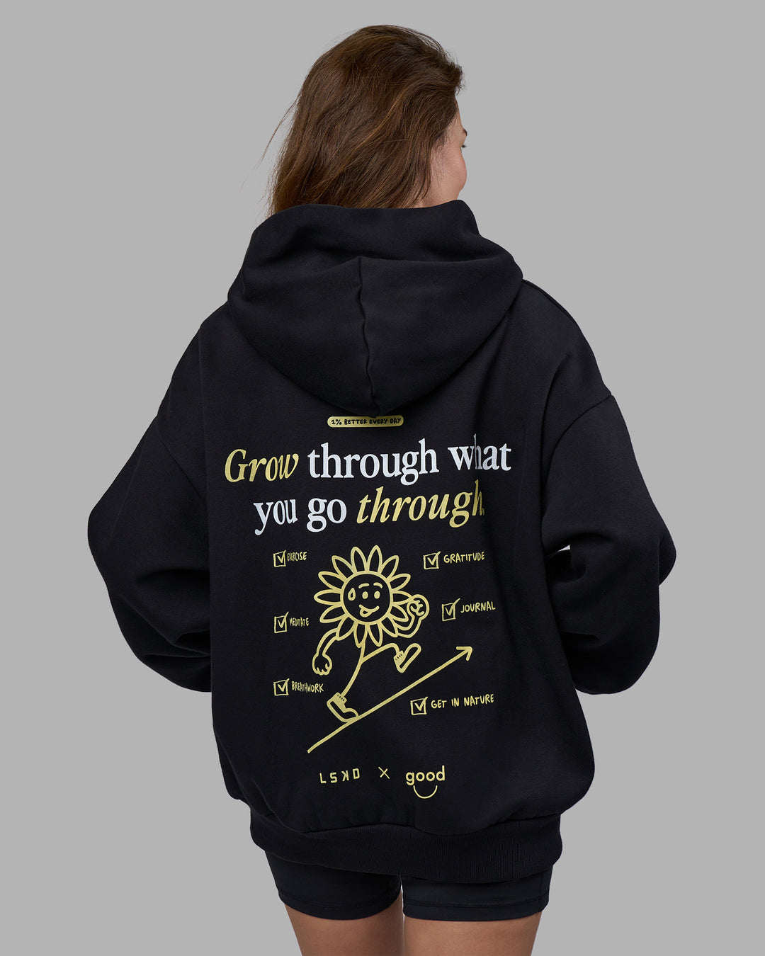 Woman wearing Good Human Factory Vol 2 Hoodie - Black | Model:Carol | Size:XS