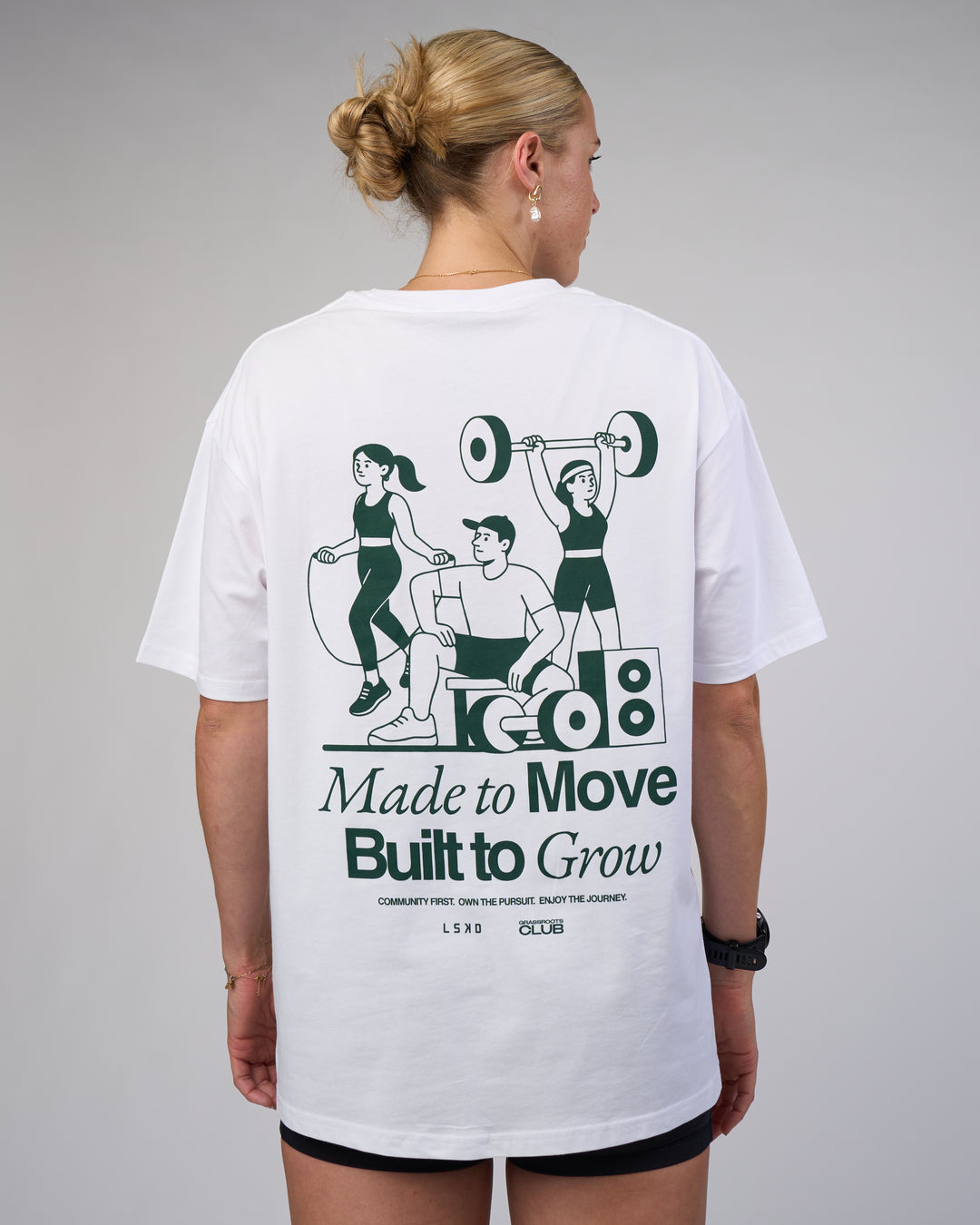 Woman wearing Grass Roots CFC FLXCotton Oversize Tee - White | Model:Shae | Size:XS