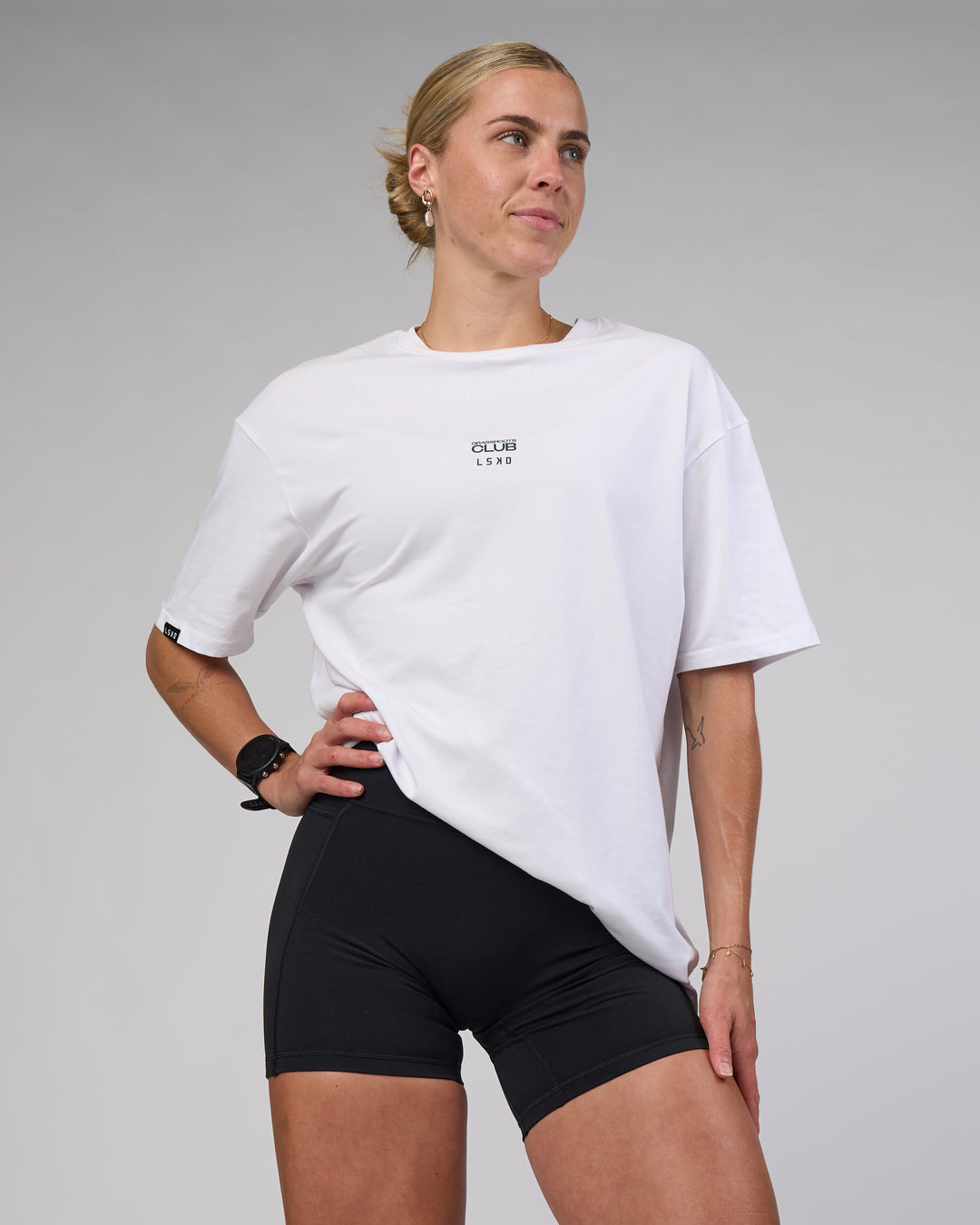 Woman wearing Grass Roots CFC FLXCotton Oversize Tee - White | Model:Shae | Size:XS
