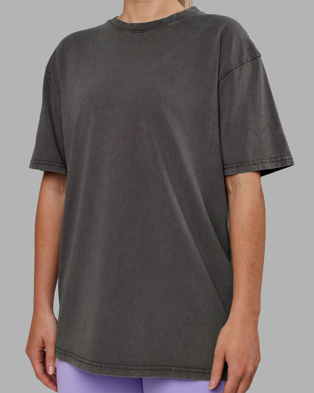 Woman wearing Heart FLXCotton Oversized Tee - Washed Dark Storm-Violet Ray | Model:Neve | Size:XS