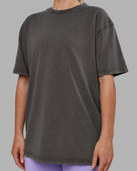 Woman wearing Heart FLXCotton Oversized Tee - Washed Dark Storm-Violet Ray | Model:Neve | Size:XS