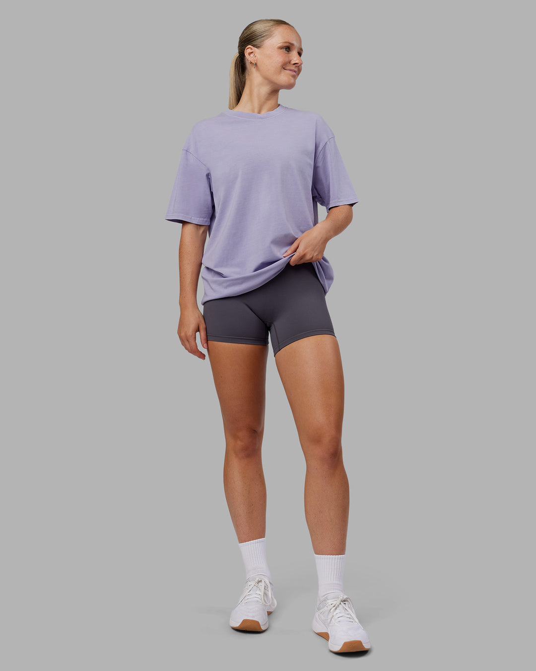 Woman wearing Heart FLXCotton Oversized Tee - Washed Violet Ray-White | Model:Neve | Size:XS