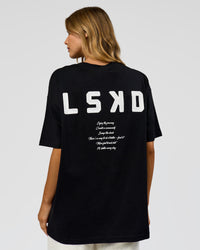 Woman wearing Hype Heavyweight Unisex Oversized Tee - Black-White | Model:Leilani | Size:XS | Thumbnail Index: 15