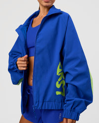 Woman wearing Hype Oversized Track Jacket - Electric Indigo | Model:Brylee | Size:XS