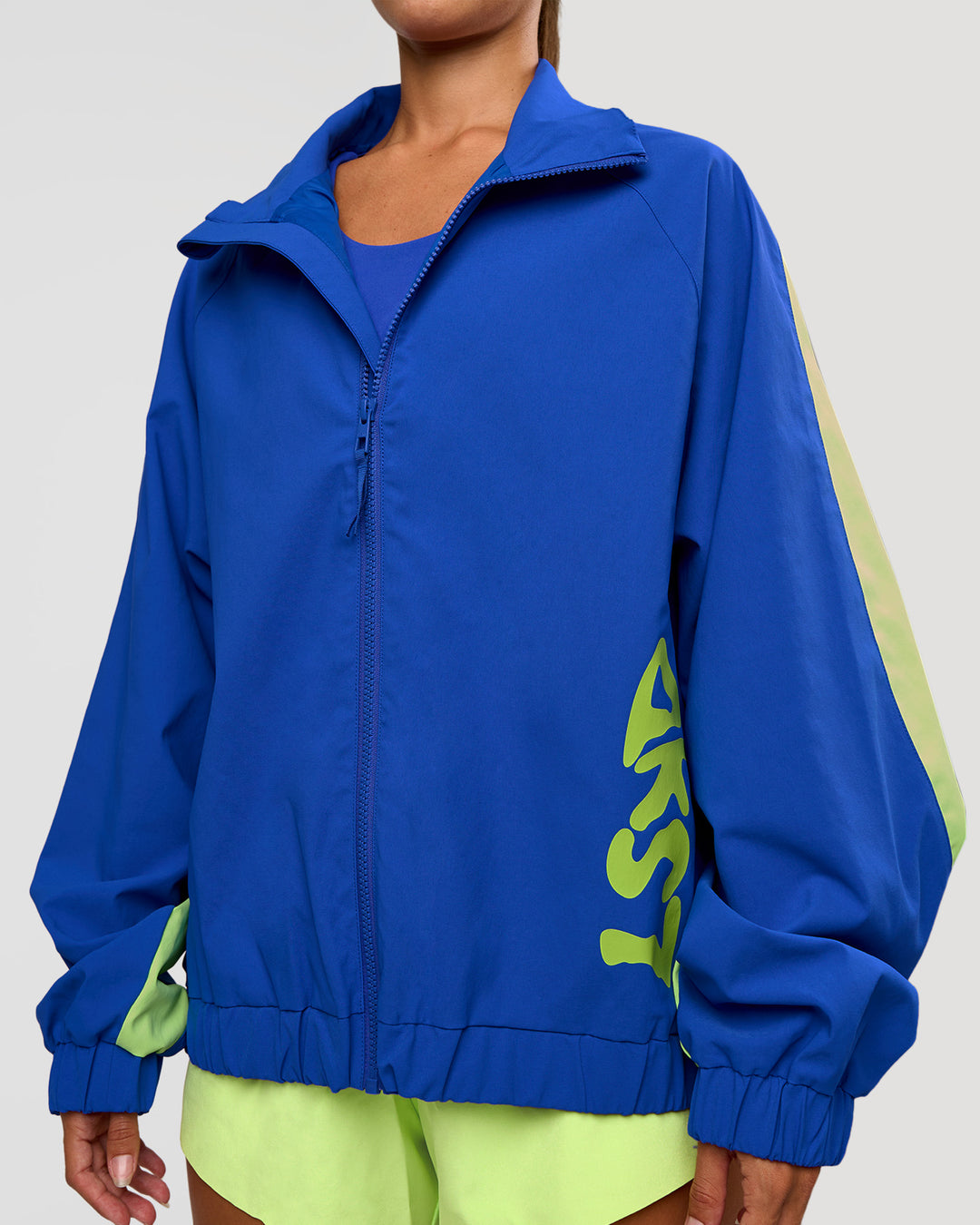 Woman wearing Hype Oversized Track Jacket - Electric Indigo | Model:Brylee | Size:XS