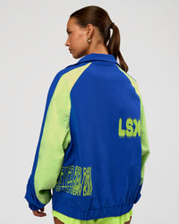 Woman wearing Hype Oversized Track Jacket - Electric Indigo | Model:Brylee | Size:XS