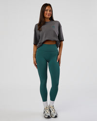 Woman wearing Inferno Journey FLXCotton Oversized Tee - Dark Storm Washed-Iceberg Green | Model:Bianca | Size:XS
