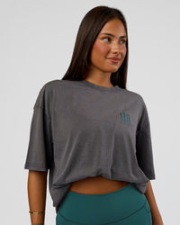 Woman wearing Inferno Journey FLXCotton Oversized Tee - Dark Storm Washed-Iceberg Green | Model:Bianca | Size:XS