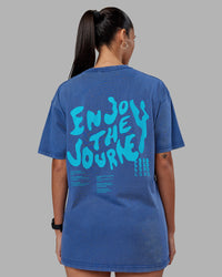 Woman wearing Inferno Journey FLXCotton Oversized Tee - Midnight Blue Washed-Blue | Model:Rhiley | Size:XS