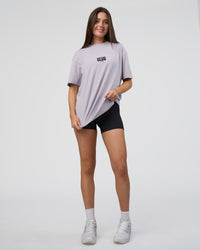 Woman wearing Kettle B FLXCotton Oversized Tee - Galactic Lilac-Black | Model:Estella | Size:XS