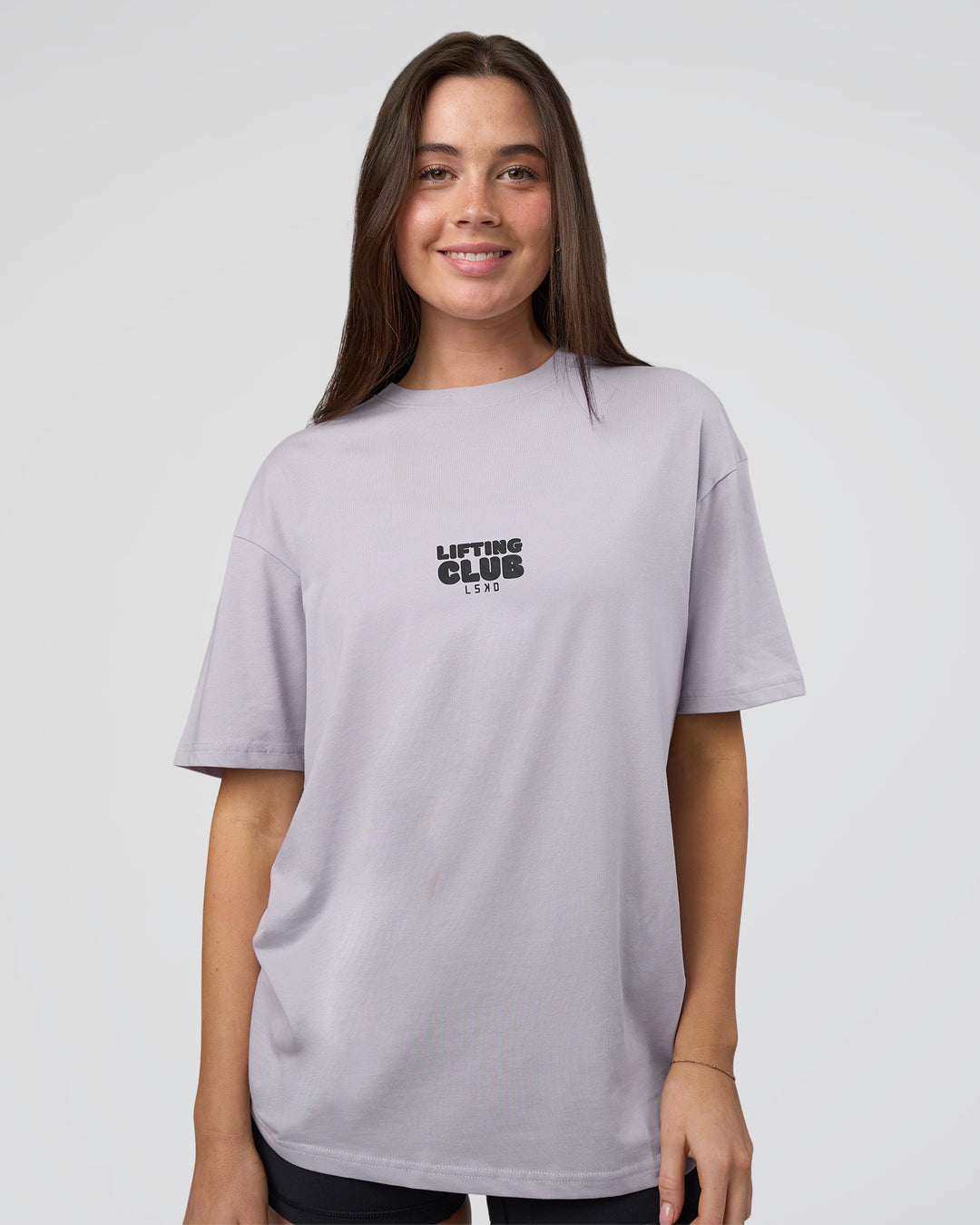 Woman wearing Kettle B FLXCotton Oversized Tee - Galactic Lilac-Black | Model:Estella | Size:XS
